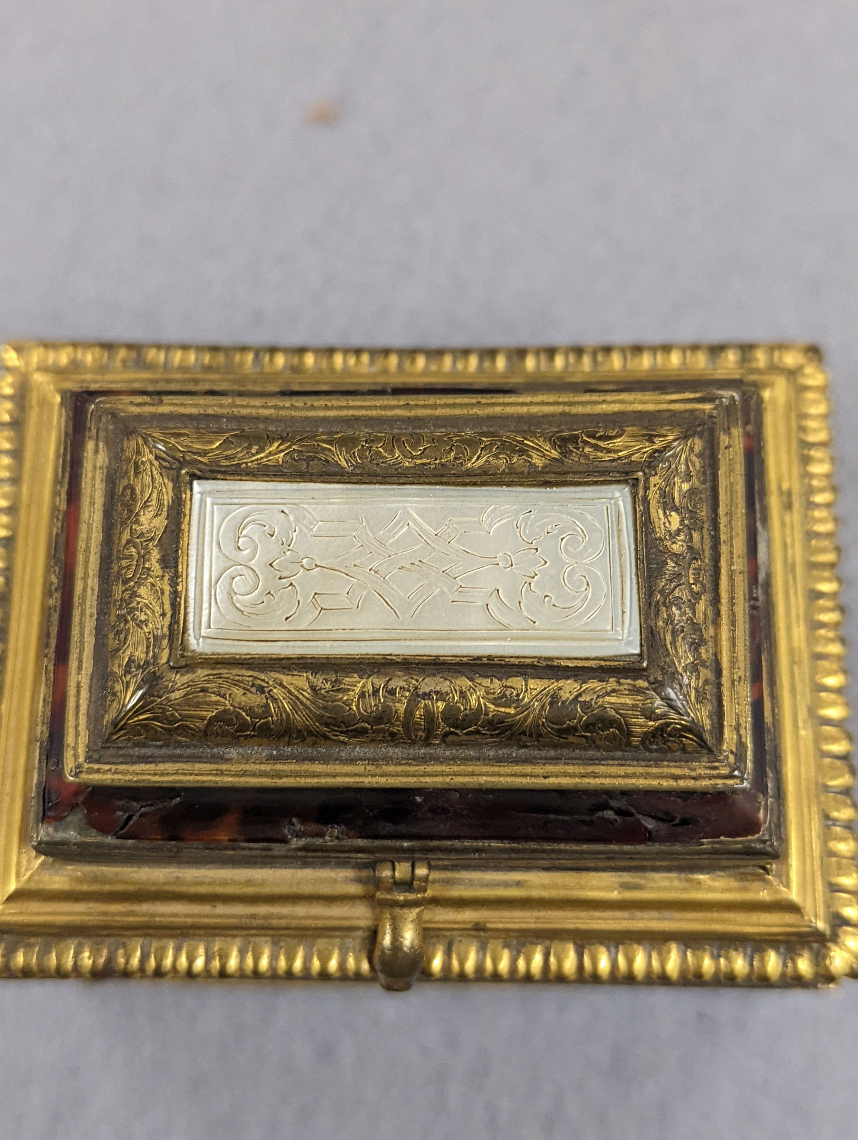 A 19th century gilt-brass and tortoiseshell casket 8cm